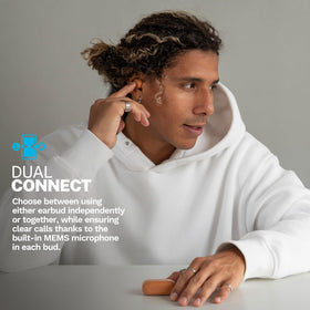 JLab earbuds in ear during run showing sweat resistance and secure fit