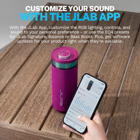 JLab Go Party inside a backpack outdoors showing travel-ready convenience