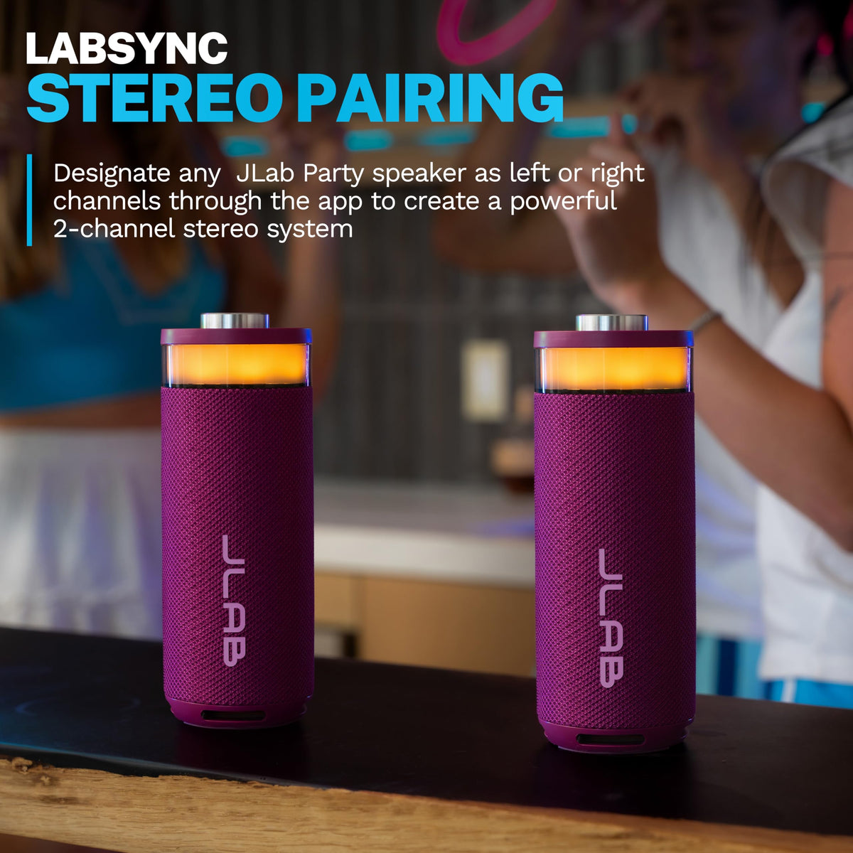 JLab Go Party with water splash illustrating IP56 resistance for outdoor durability