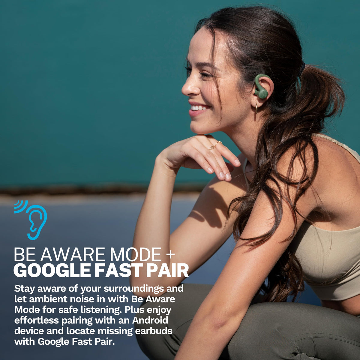 JLab Go Sport+ earhook close-up highlighting secure fit for workouts