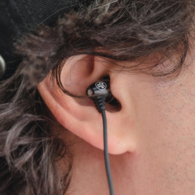 JLab JBuds J6MS ergonomic one-ear design for extended comfort.