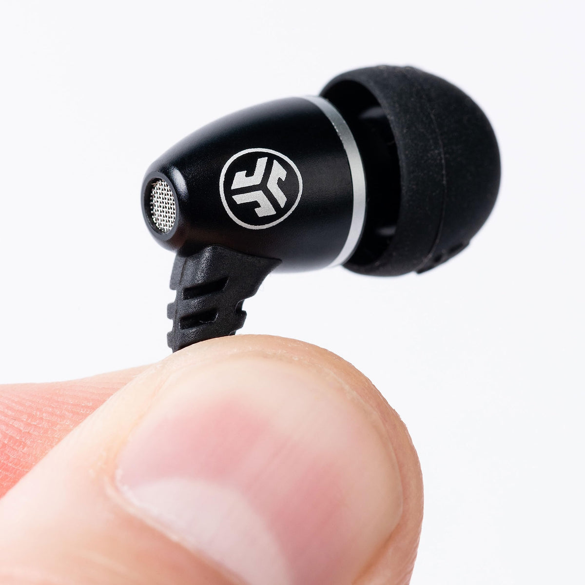 JLab JBuds J6MS inline microphone and control button for hands-free calls.