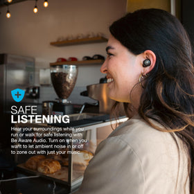 JLab JBuds ANC 3 user wearing one earbud, enjoying single-ear use.