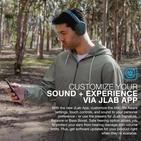 JLab JBuds Lux ANC worn on commuter demonstrating ANC reducing background noise for focus
