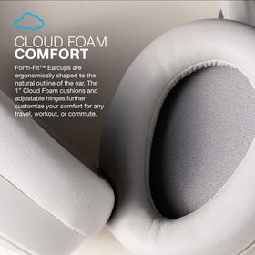 Person wearing JLab JBuds Lux ANC during commute for distraction-free travel