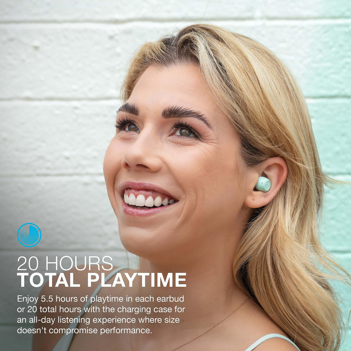 JLab earbuds worn in-ear during a run showing secure fit and sweat resistance