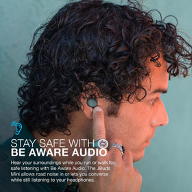 JLab JBuds Mini worn by runner showing sweat resistance and active use benefit