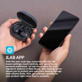 JLab JBuds Sport ANC 4 held in hand to show compact scale and travel convenience
