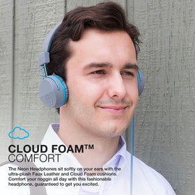 JLab Neon on-ear headphones worn for comfort with stainless steel headband and plush cushions.
