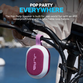 JLab Pop Party held in hand to show scale and travel-ready size