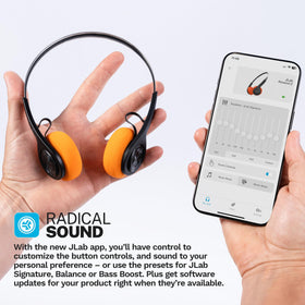 JLab Rewind 2 held in hand to show compact scale and portability