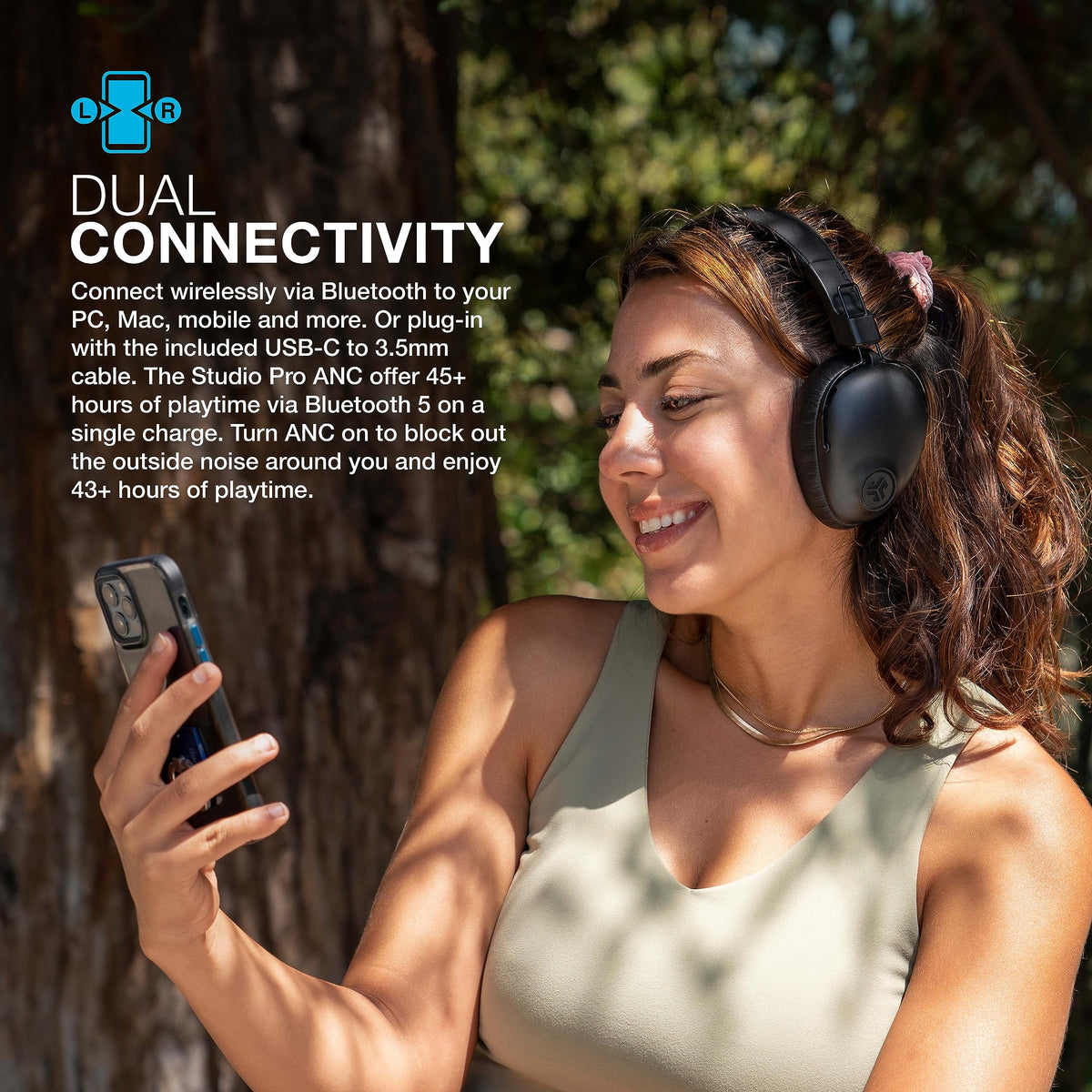 JLab Studio Pro ANC headphones illustrating dual connectivity for quick device pairing.