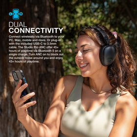 JLab Studio Pro ANC headphones illustrating dual connectivity for quick device pairing.