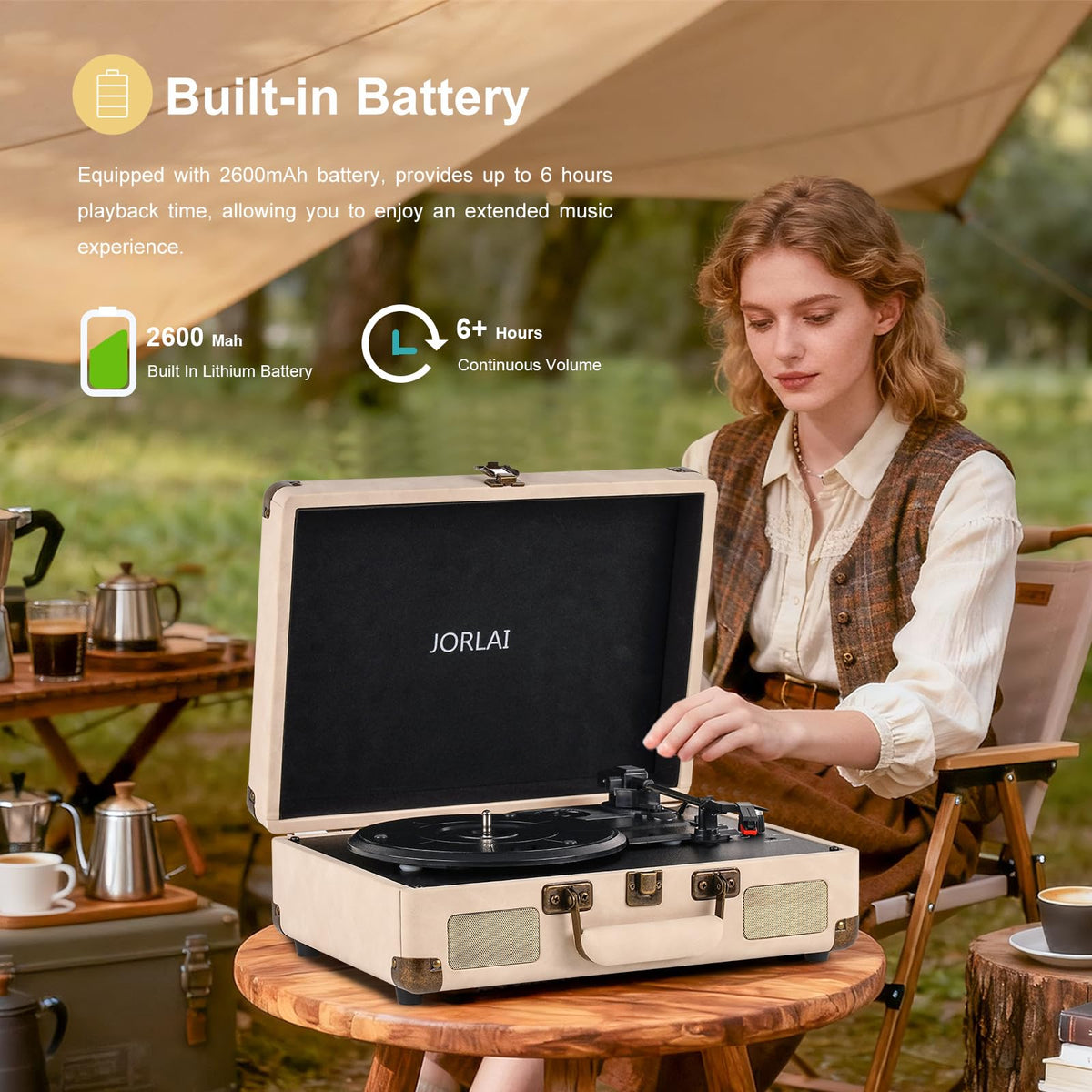 JORLAI portable turntable in use at a picnic showing battery-powered outdoor audio