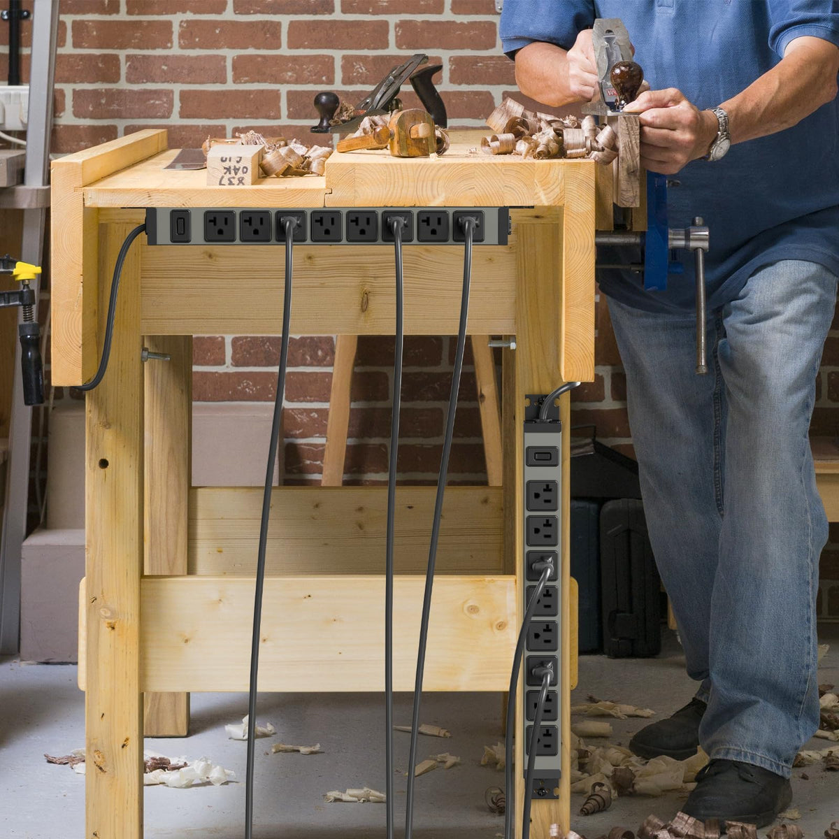 JUNNUJ installed on a garage workbench powering tools and keeping workspace organized