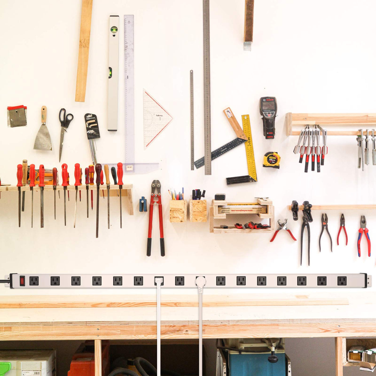 JUNNUJ mounted on garage wall showing neat organization and accessible power