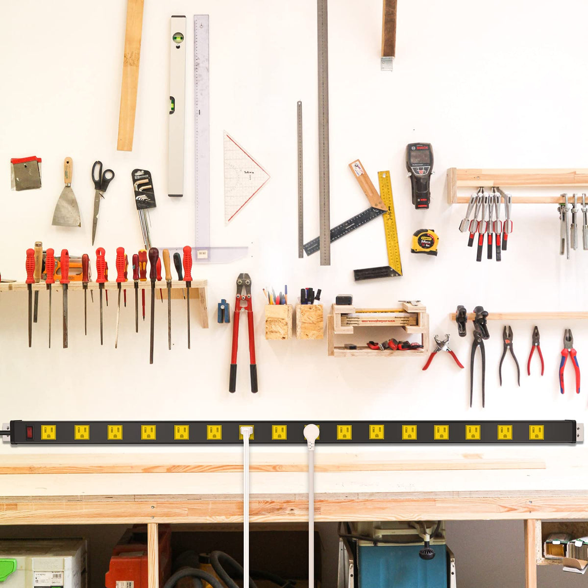 JUNNUJ power strip next to hand tool to show scale and capacity for multiple devices