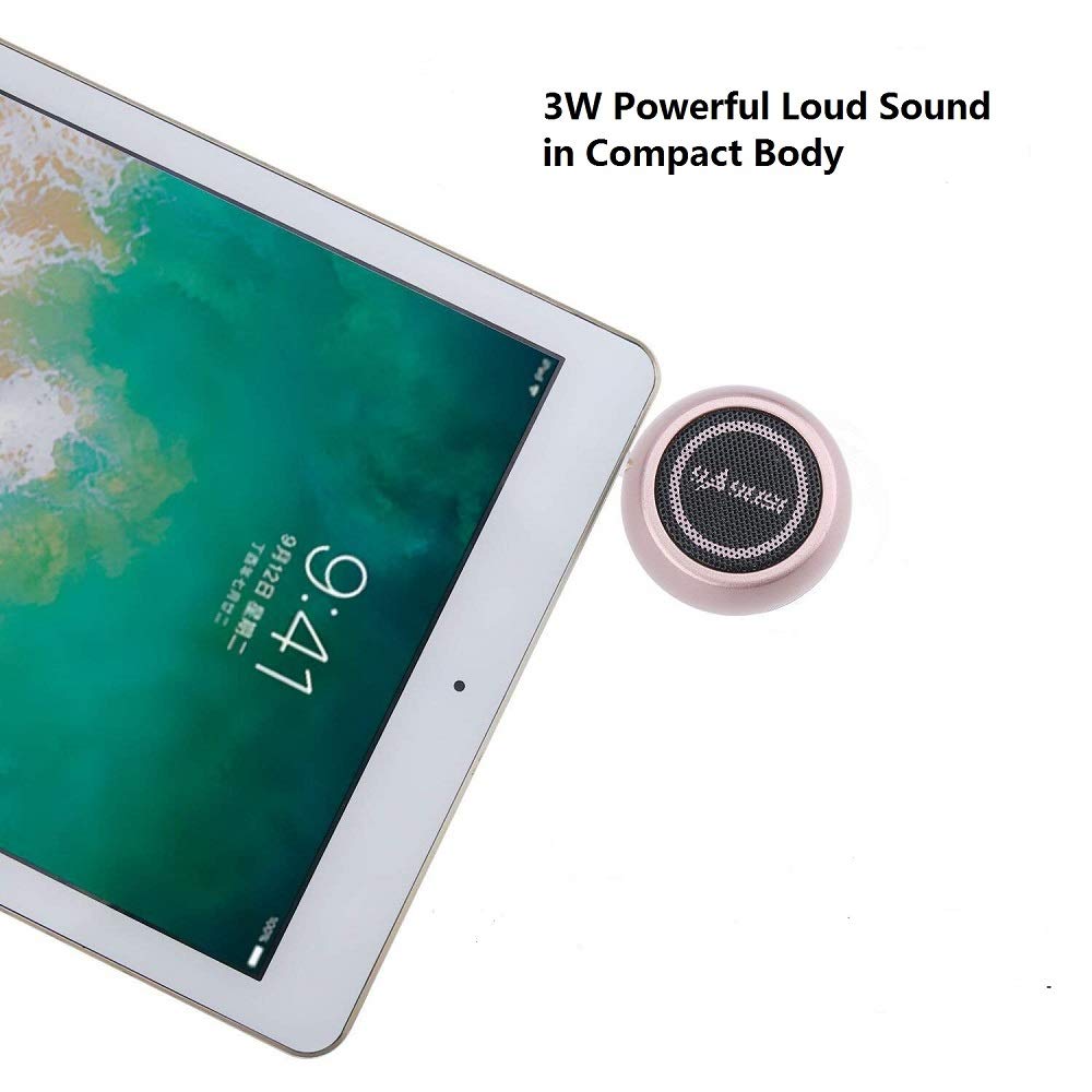 K-Tech next to a smartphone to show compact size and portability benefit