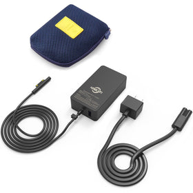 KABCON charger next to a laptop for scale, compact high-power solution for Surface users