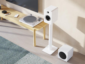 Adjustable feet and carpet spikes ensure level sound on any floor