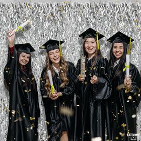 KatchOn XtraLarge wavy silver foil curtain used as graduation backdrop