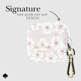 kate spade new york gold keychain ring clipped to a bag for hands-free carrying