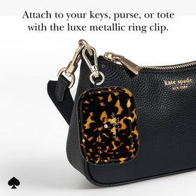 kate spade new york metallic keychain clip attached to hand showing convenience