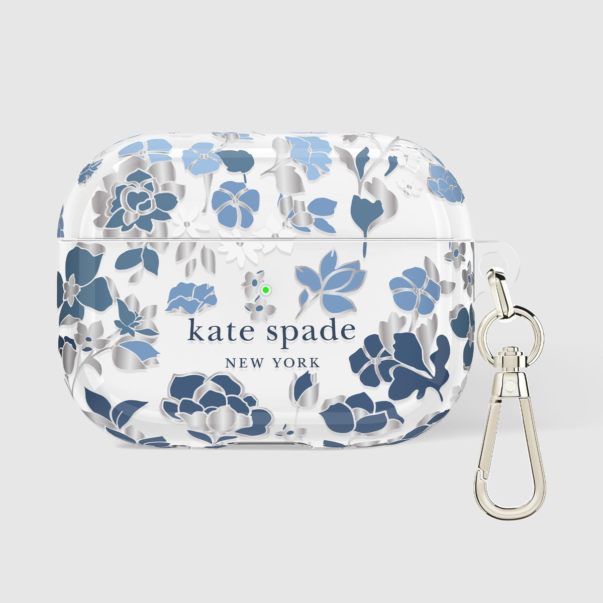 kate spade new york clipped to a bag in city setting for stylish everyday convenience