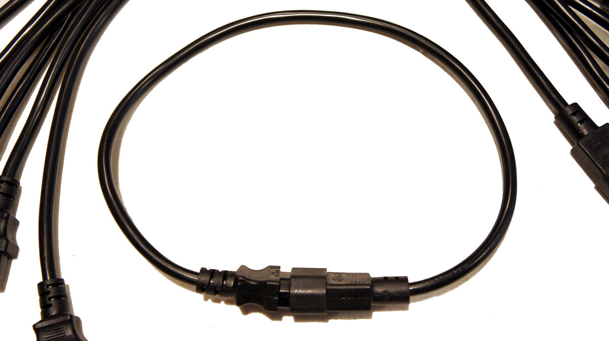 Keen Eye two-foot cable beside ruler showing compact size and manageability