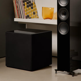 KEF Kube 15 MIE in-room setup demonstrating room-filling bass with flexible placement