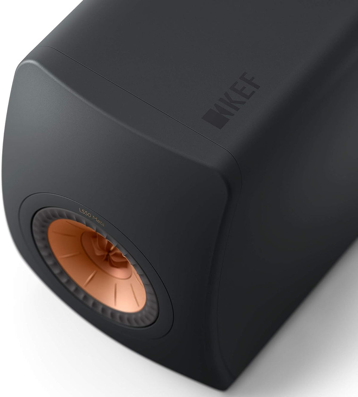 KEF LS50 Meta rear panel shows ports and clean cable connections.