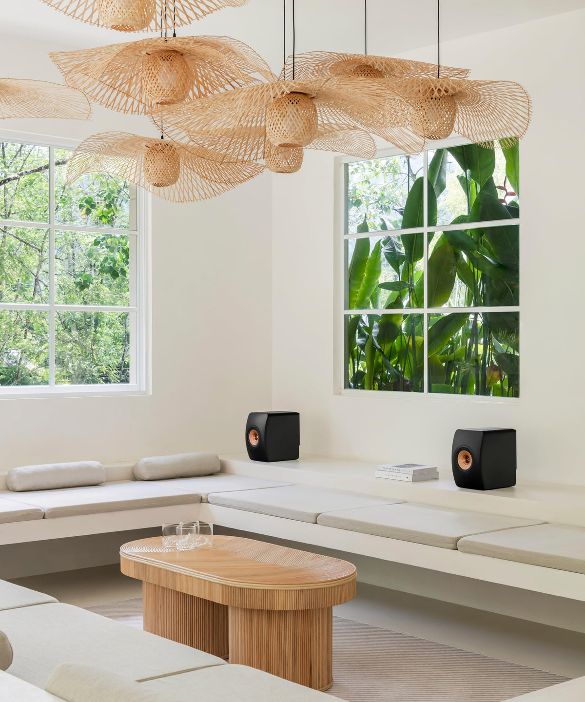 KEF LS50 Wireless II in a living room setup demonstrates room-filling stereo.