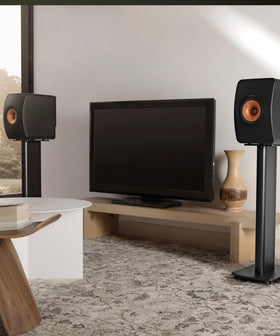 KEF LS50 Wireless II rear panel shows HDMI eARC and versatile inputs for setup.
