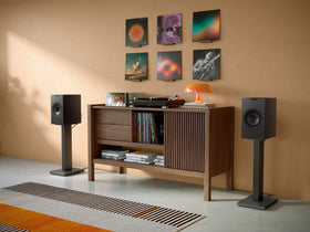 KEF Q1 Meta satin finish with color-matched grille for premium aesthetics.