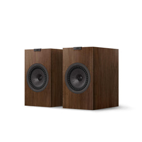 KEF Q3 Meta walnut front view shows premium finish in a compact bookshelf speaker.
