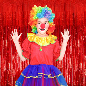 K.E.J. red metallic foil curtain enhances photo booth visuals.