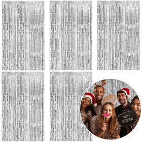 K.E.J. foil curtain silver backdrop enhances party entrances and photo moments beautifully.