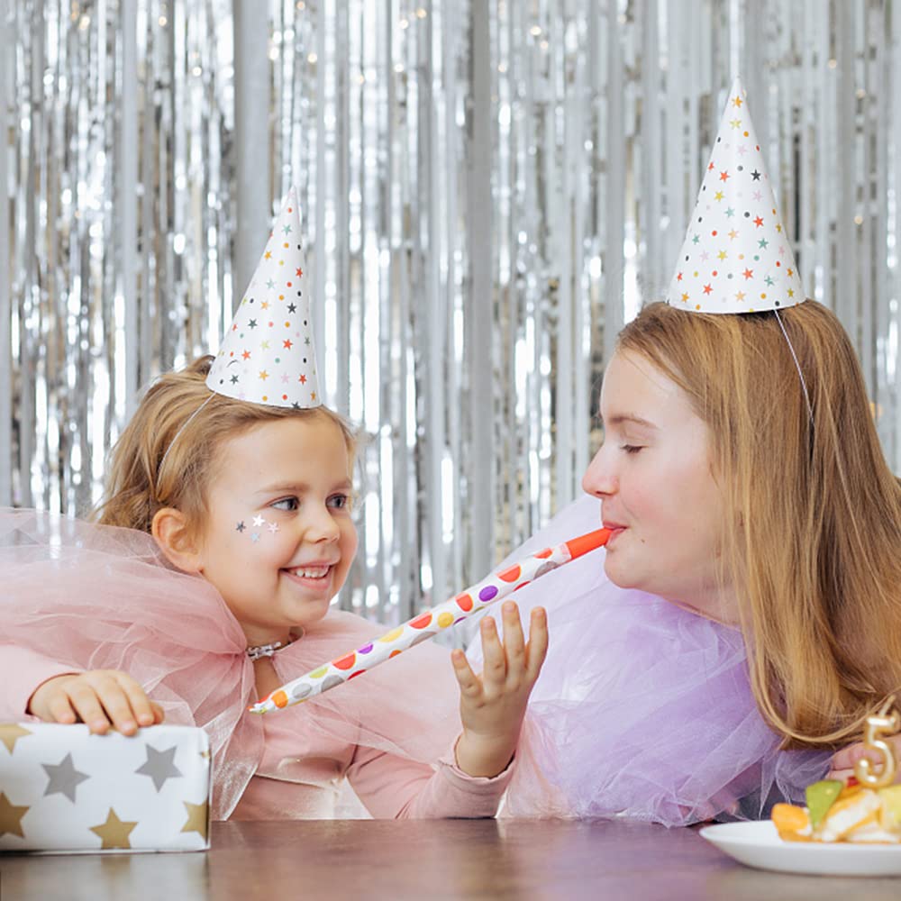 K.E.J. foil fringe curtain silver adds sparkle to events and photos.