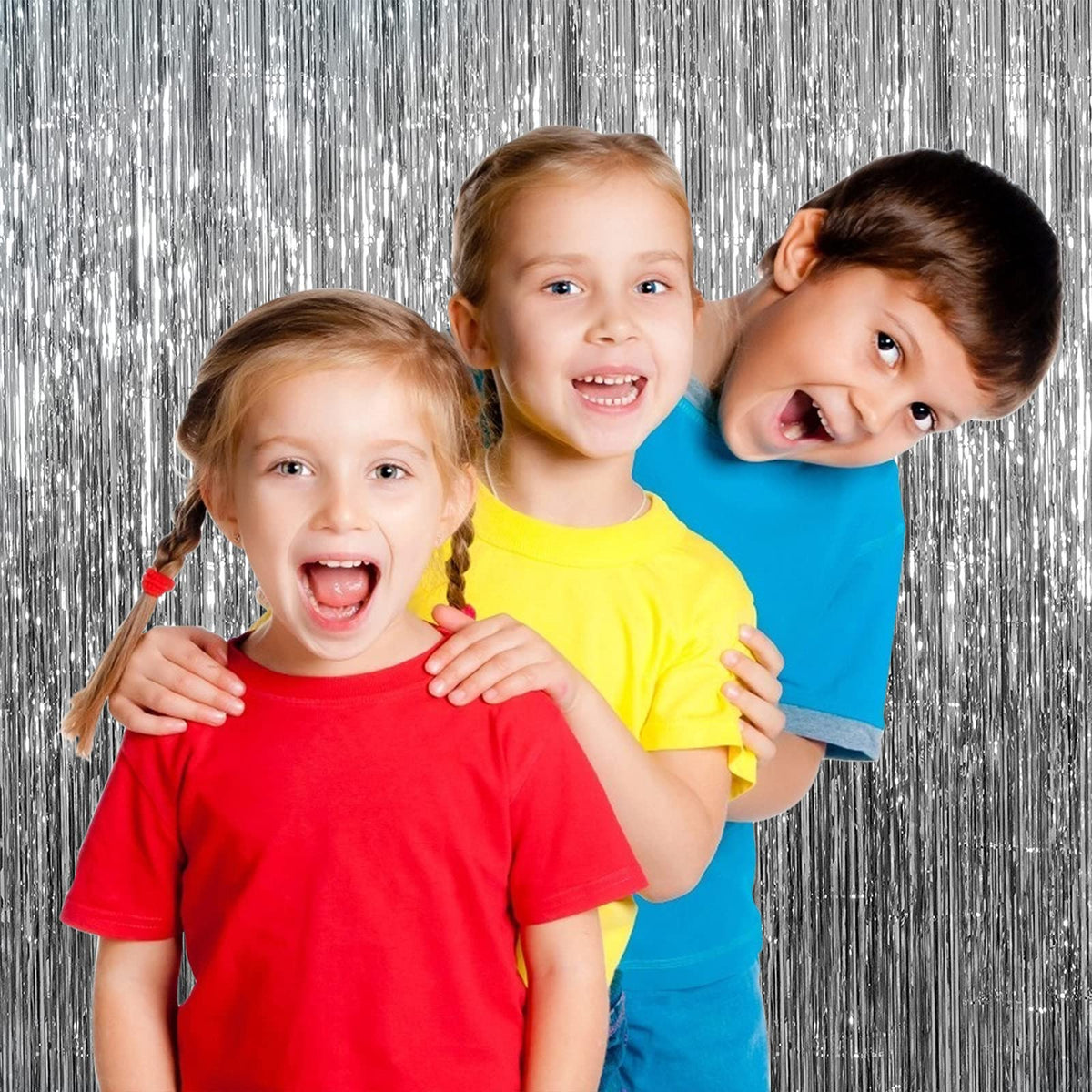 K.E.J. foil curtain silver photo booth backdrop supports memorable portraits.