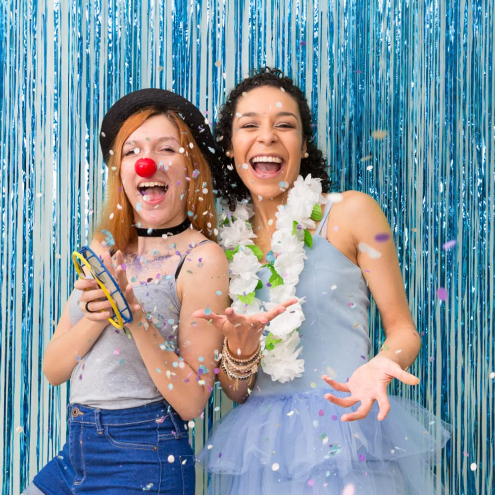 K.E.J blue fringe curtain adds photo booth sparkle and wall decor