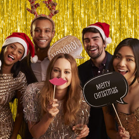 K.E.J. party decor foil curtain in gold elevates birthday celebrations.