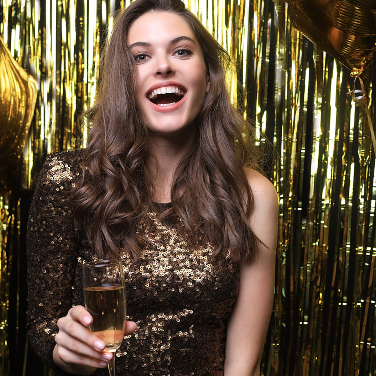 K.E.J. wall and door decor foil curtain in gold brightens any room.