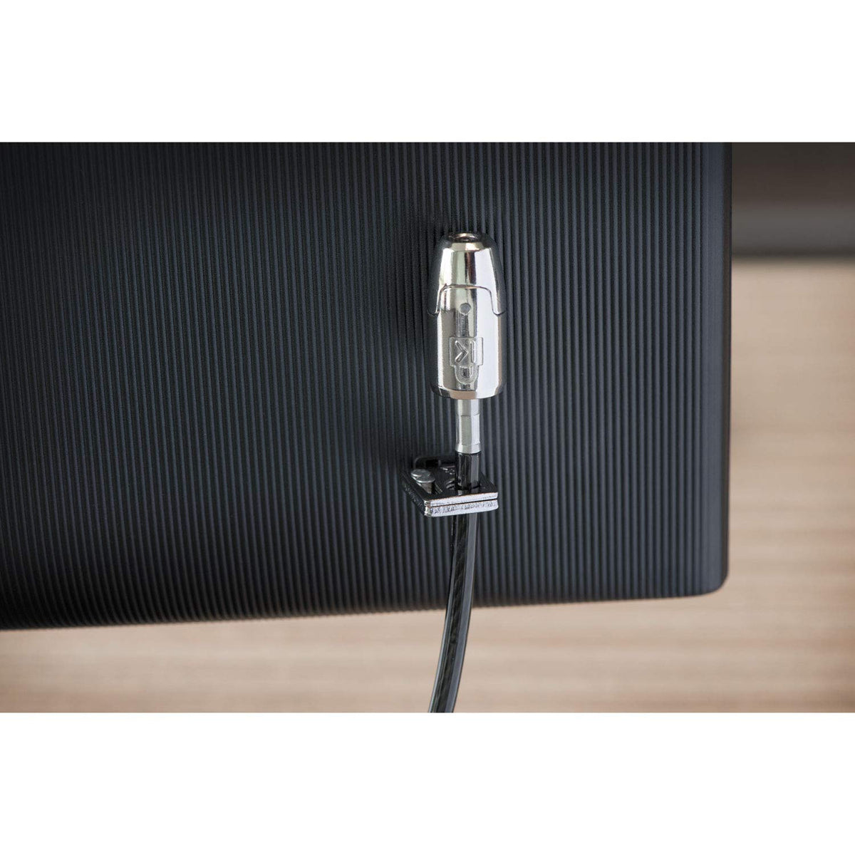 Kensington 8-foot carbon steel cable coiled demonstrating cut-resistant strength