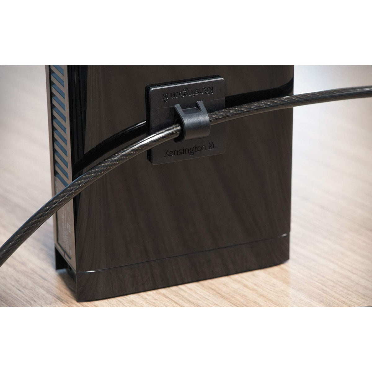 Kensington cable trap holding external drive in place reducing theft risk