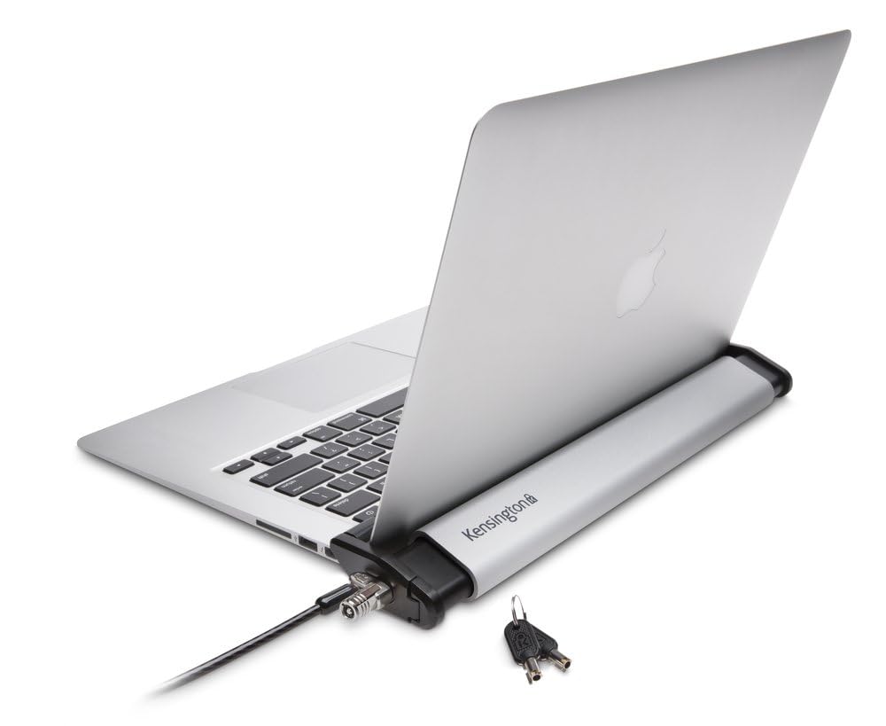 Kensington Laptop Locking Station 2.0 securing a MacBook on a desk for security.