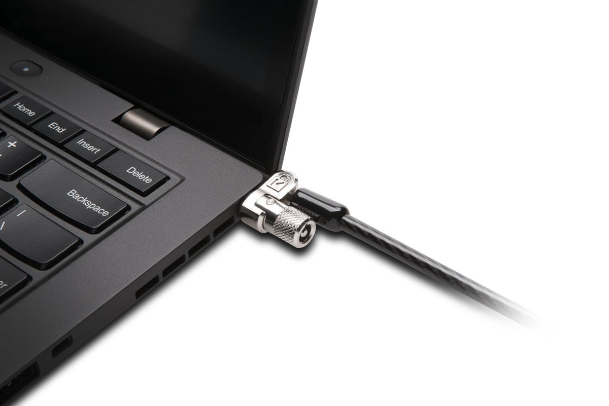 Kensington lock installed on laptop in office demonstrating theft deterrence