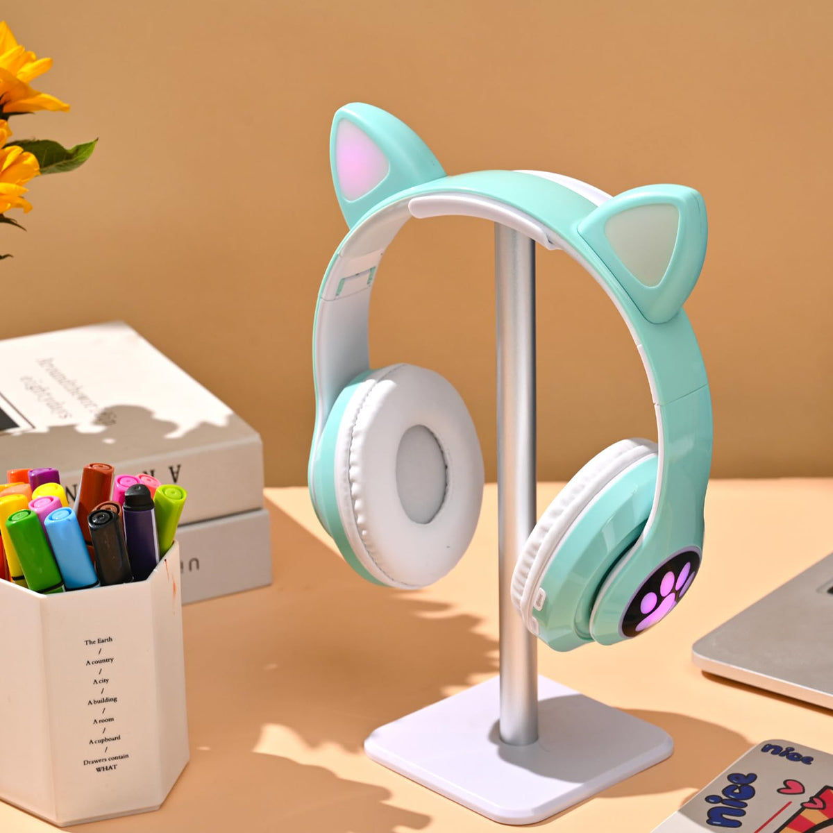 KERHAND LED cat ears glow on green headphones for playful style.