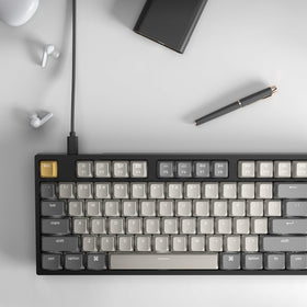 Keychron on a desk with keyboard size comparison for compact footprint benefit