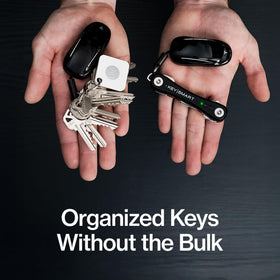 KeySmart iPro charging port detail showing rechargeable battery convenience