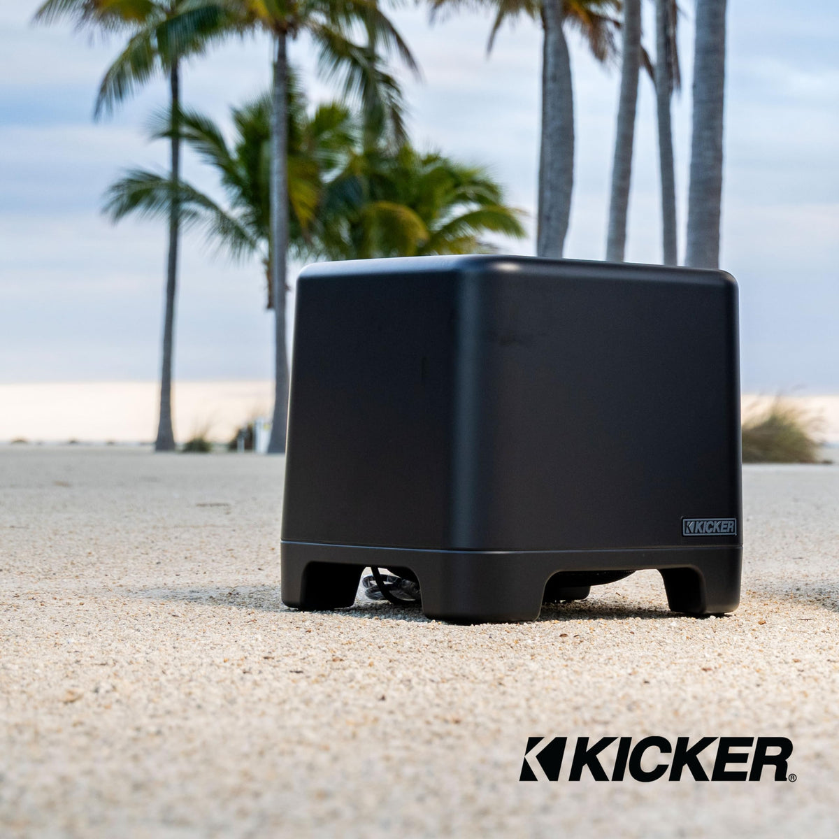 KICKER 51OAW10B poolside-bass enhances outdoor gatherings.